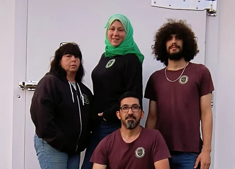 Co-owners Kathryn Piper and Hussam AlRawi (center) and their team at Five Pillars Butchery.